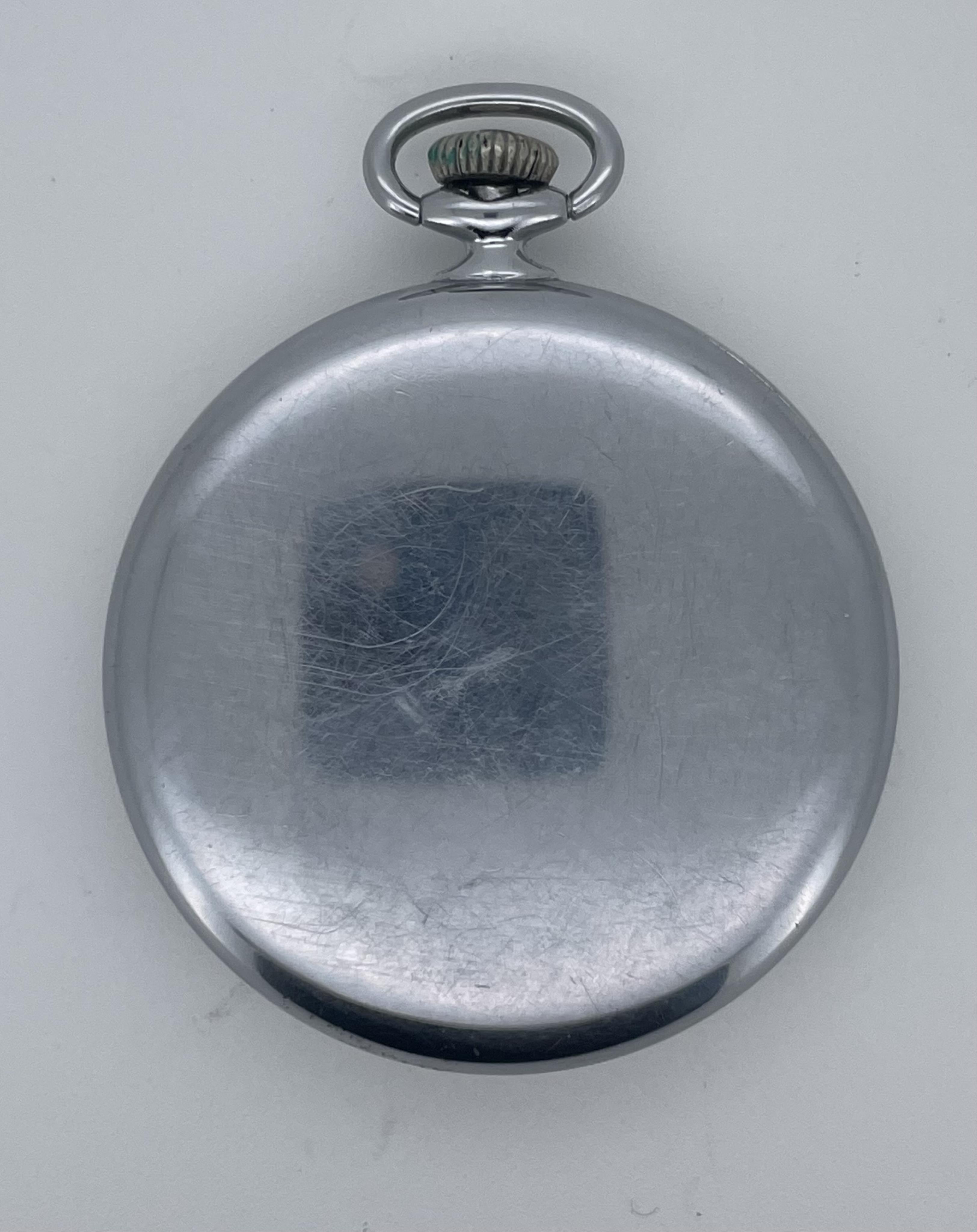 An Omega Geneve stainless steel open faced keyless dress pocket watch, with Arabic dial and subsidiary seconds, case diameter 47mm.